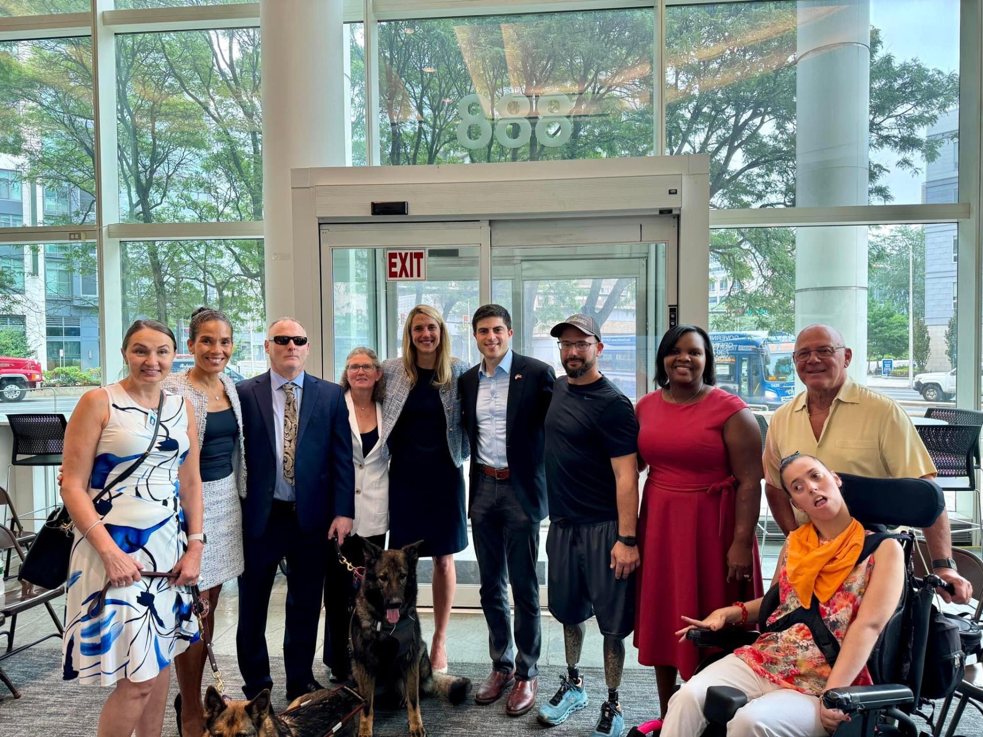 Mayor Simmons smiles for a photo during the ADA Celebration with State Reps. Khana and Blumenthal and members of the Stamford ADA Council