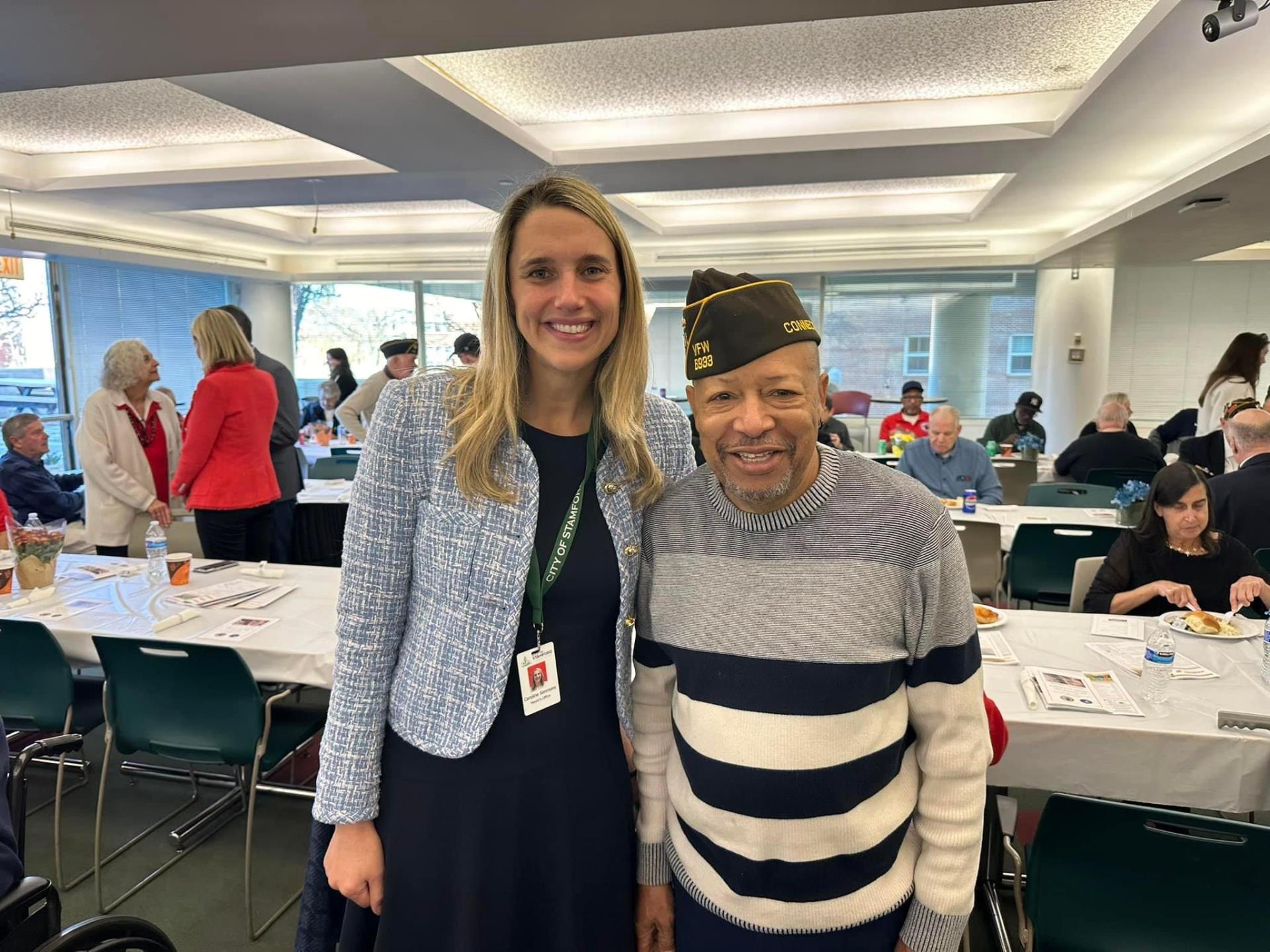 Mayor Simmons smiles for a photo with a veteran