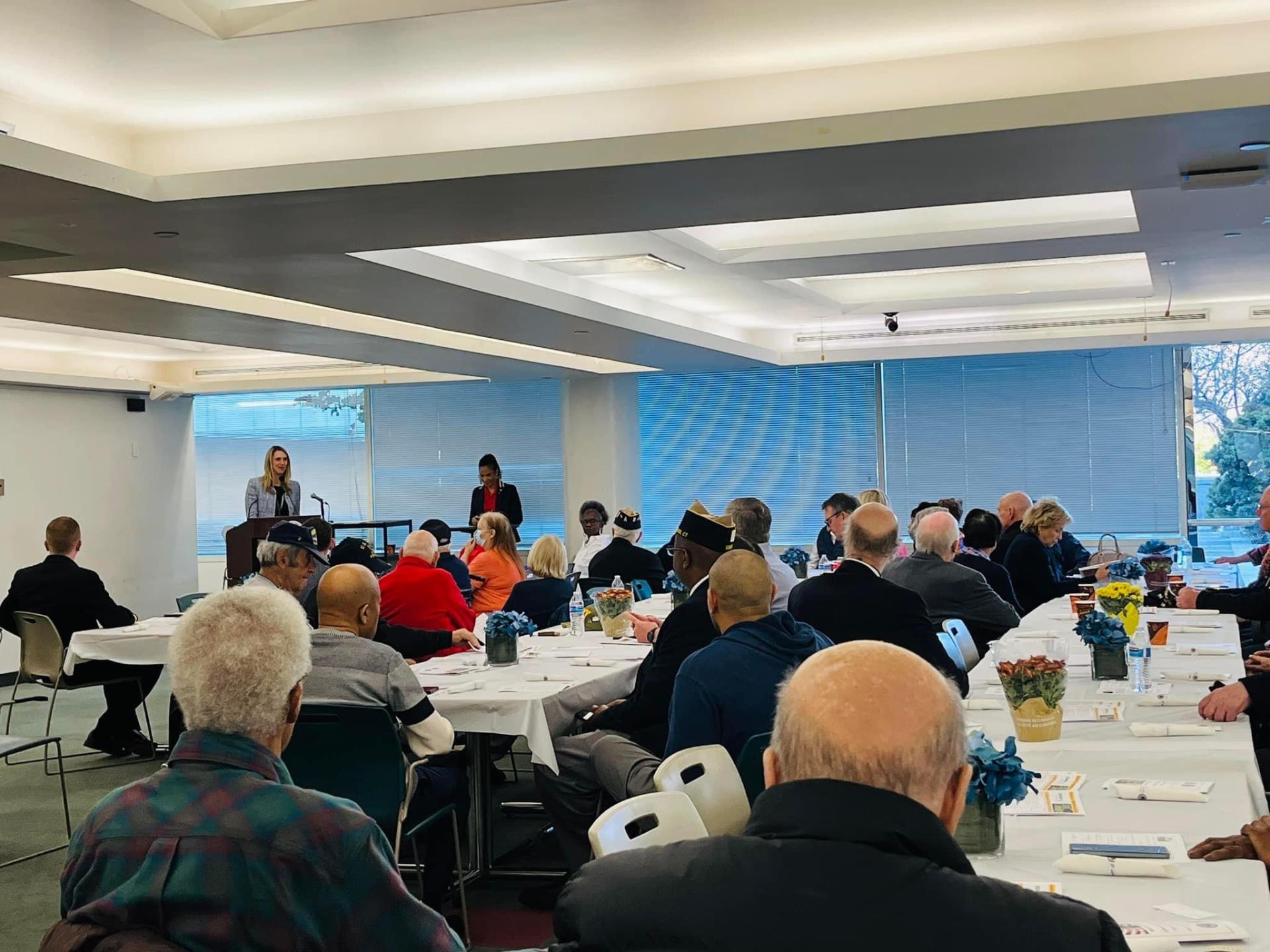 Mayor Simmons speaks with veterans during the Veterans Lunch